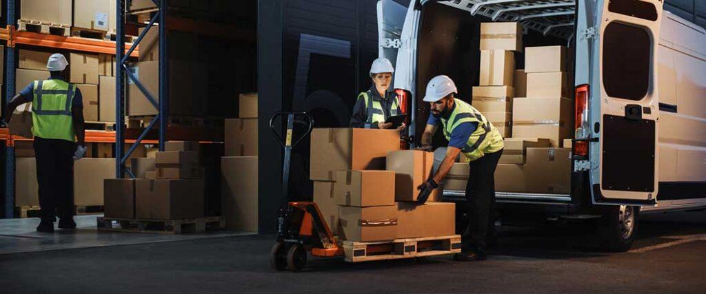 Warehouse employees loading=