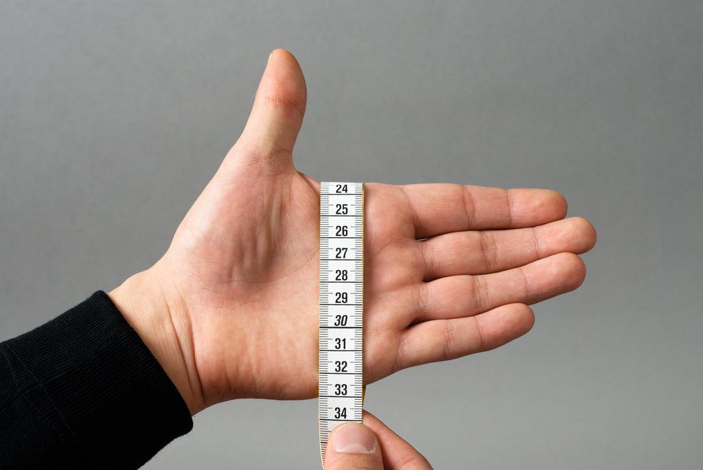 Measuring a hand for glove sizing