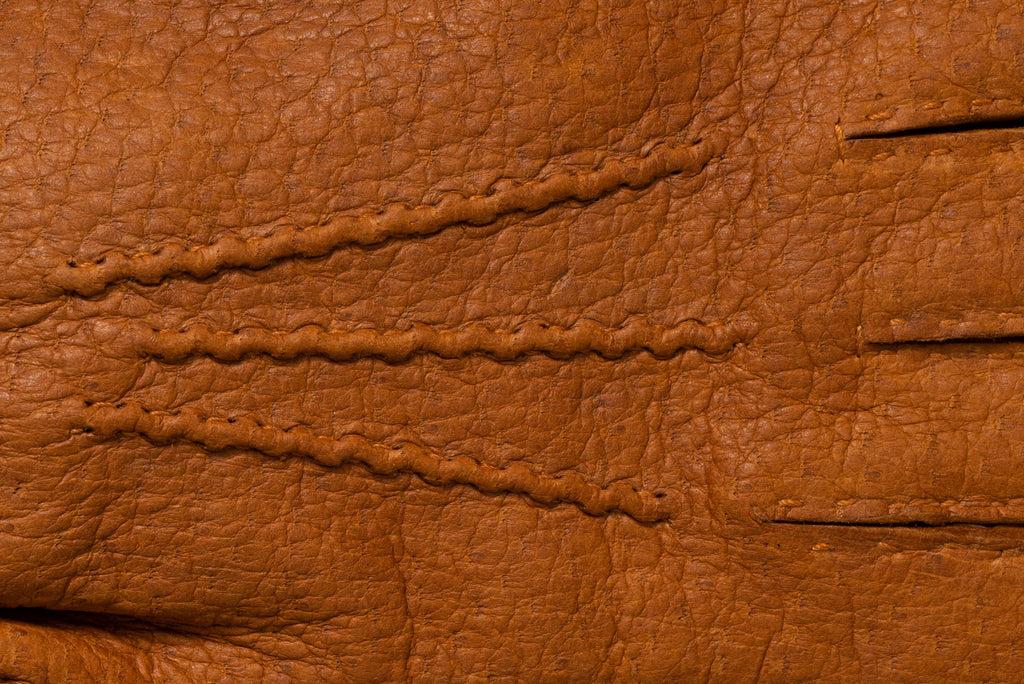 Closeup details of peccary leather gloves