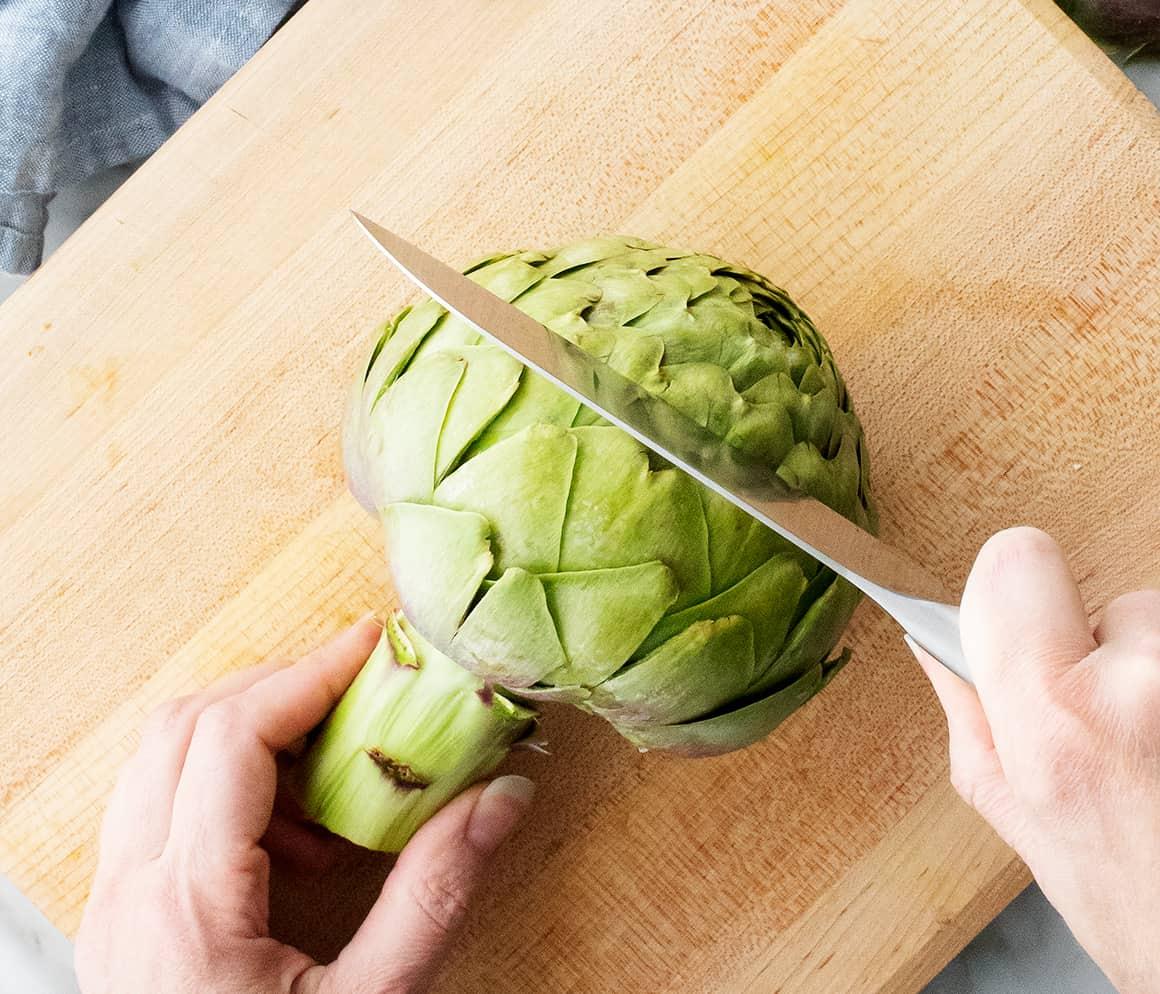 How to prepare an artichoke - slicing off top with knife