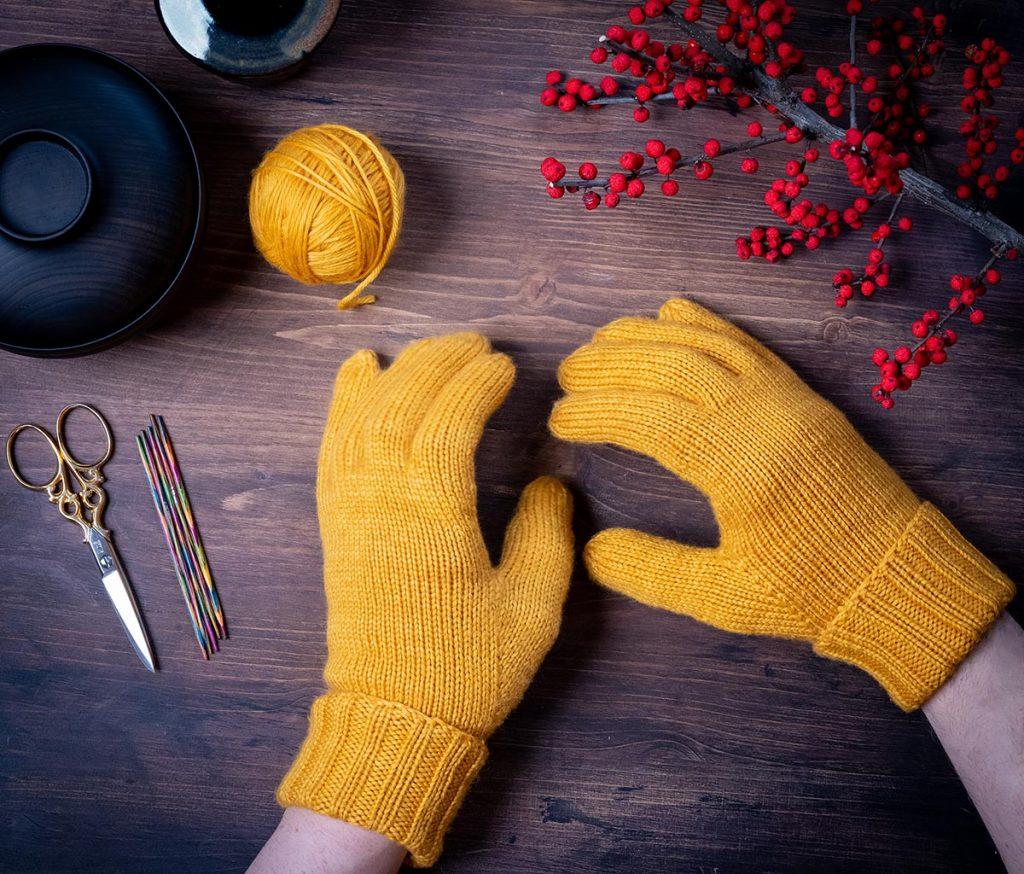 me wearing the finished glove knitting pattern