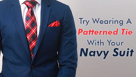 Try Wearing A Patterned Tie With Your Navy Suit
