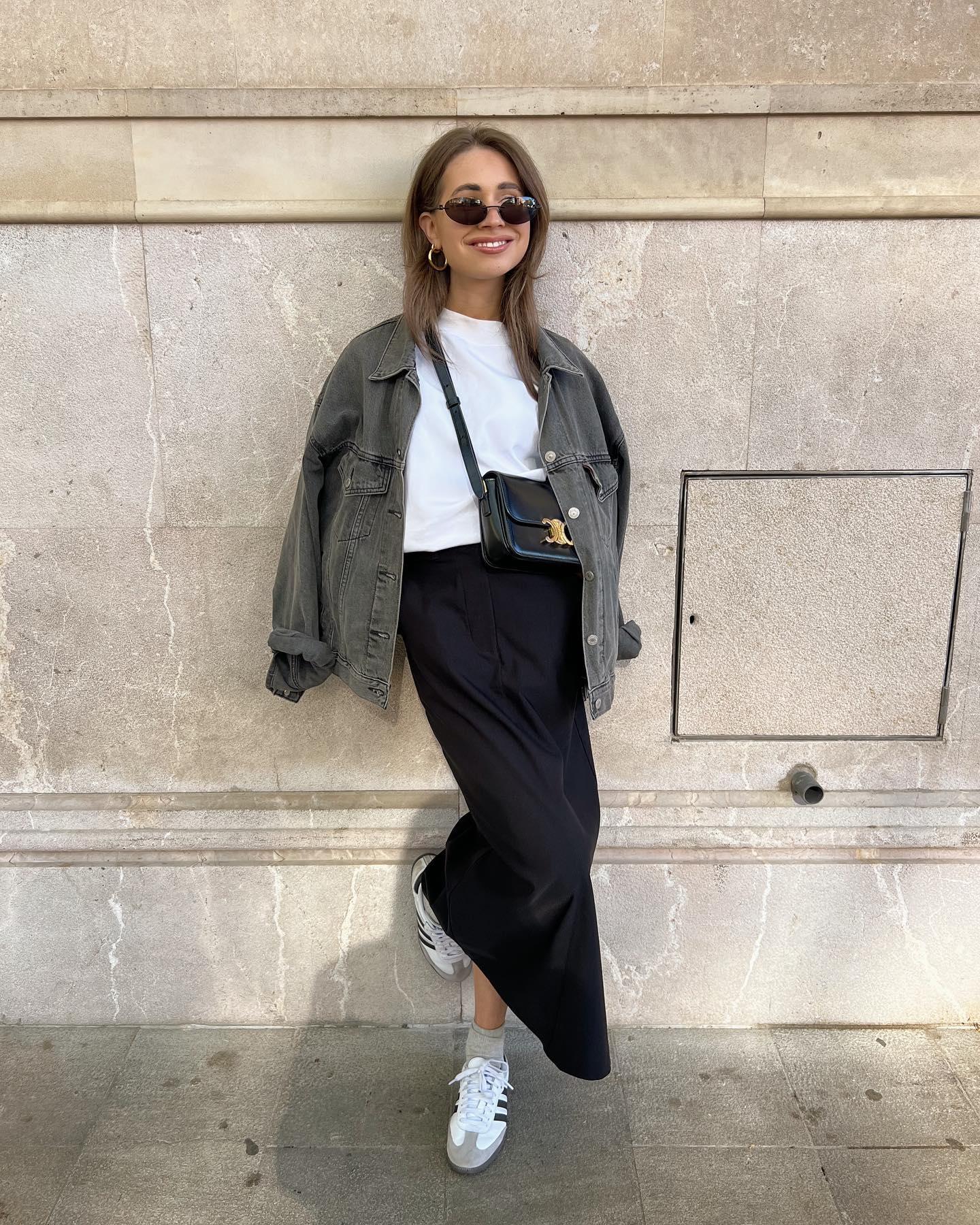 how to dress down a maxi satin skirt with sneakers and a denim jacket