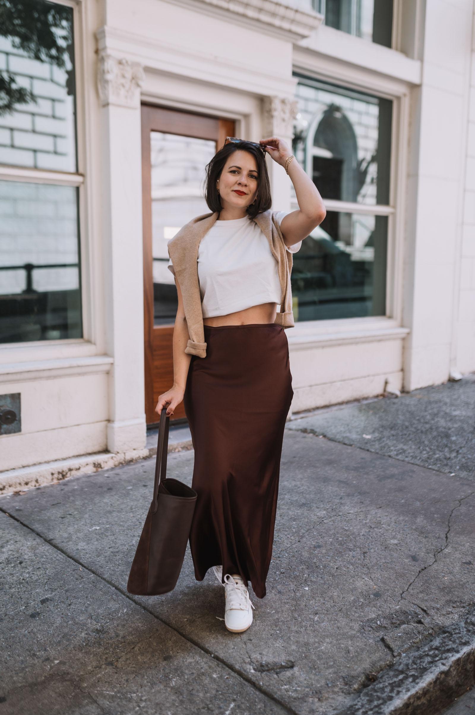Lioness satin maxi skirt, reformation tee, j.crew sweater, new balance sneakers