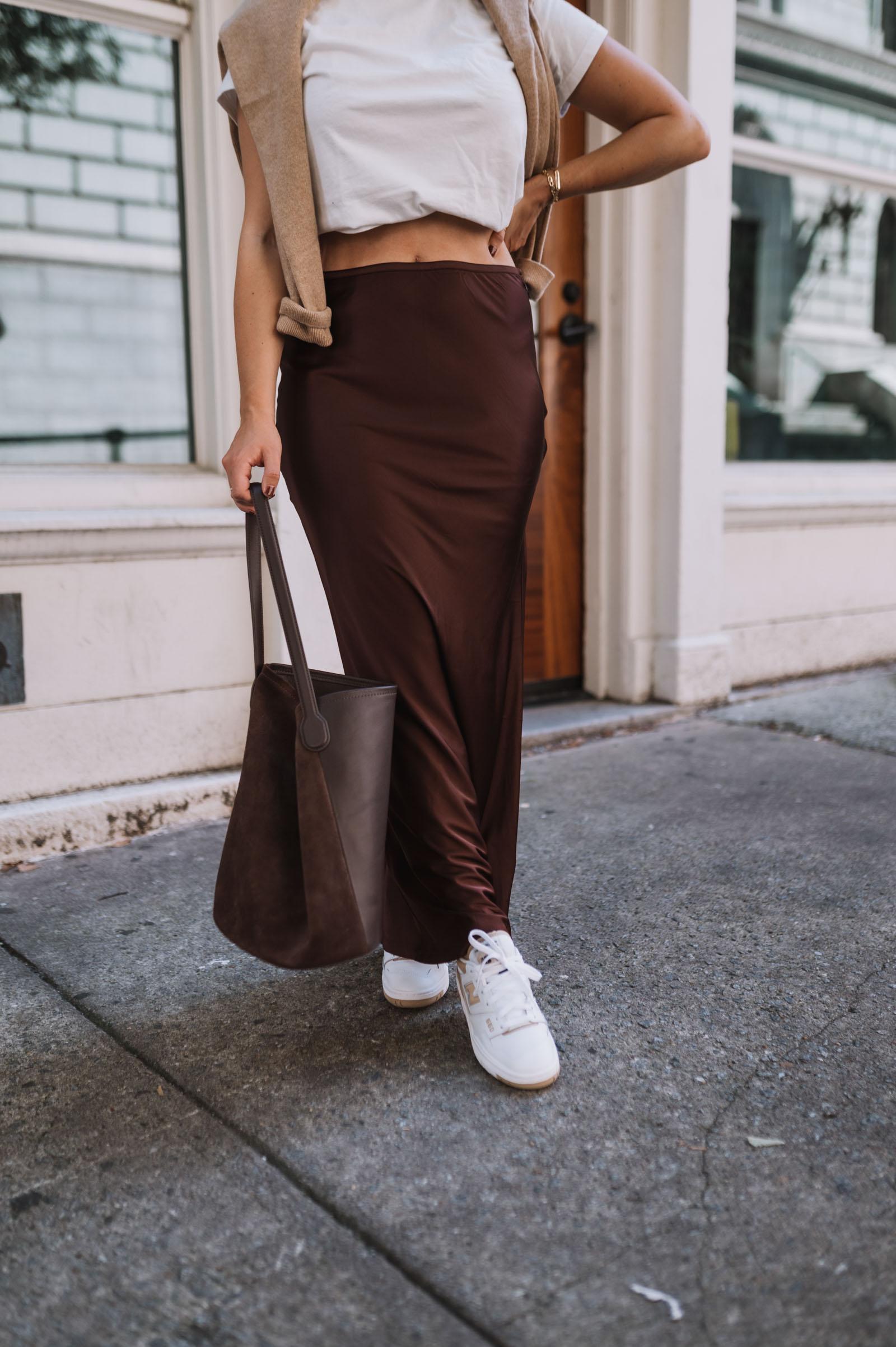 brown satin maxi skirt and sneakers