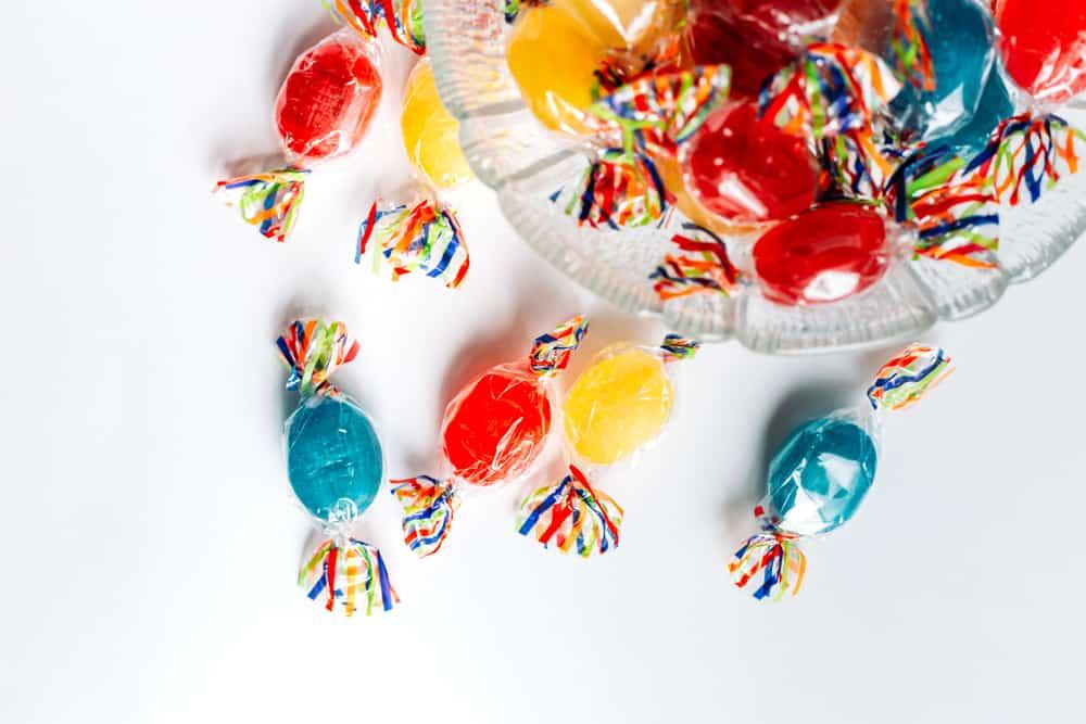 Bowl full with mix hard wrapped candies