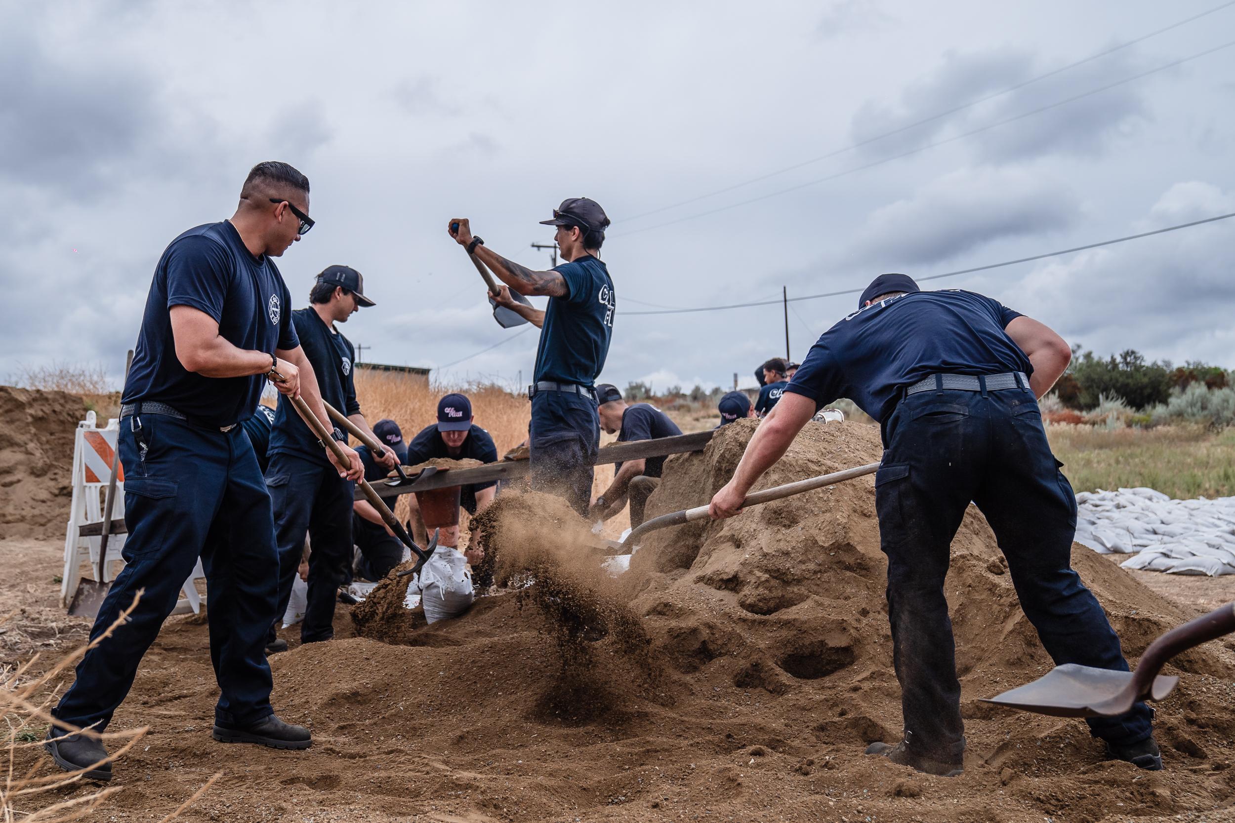 Firefighters at Fire Station 47 pack sandbags on Aug. 19, 2023 at Pacific Highlands Ranch.
