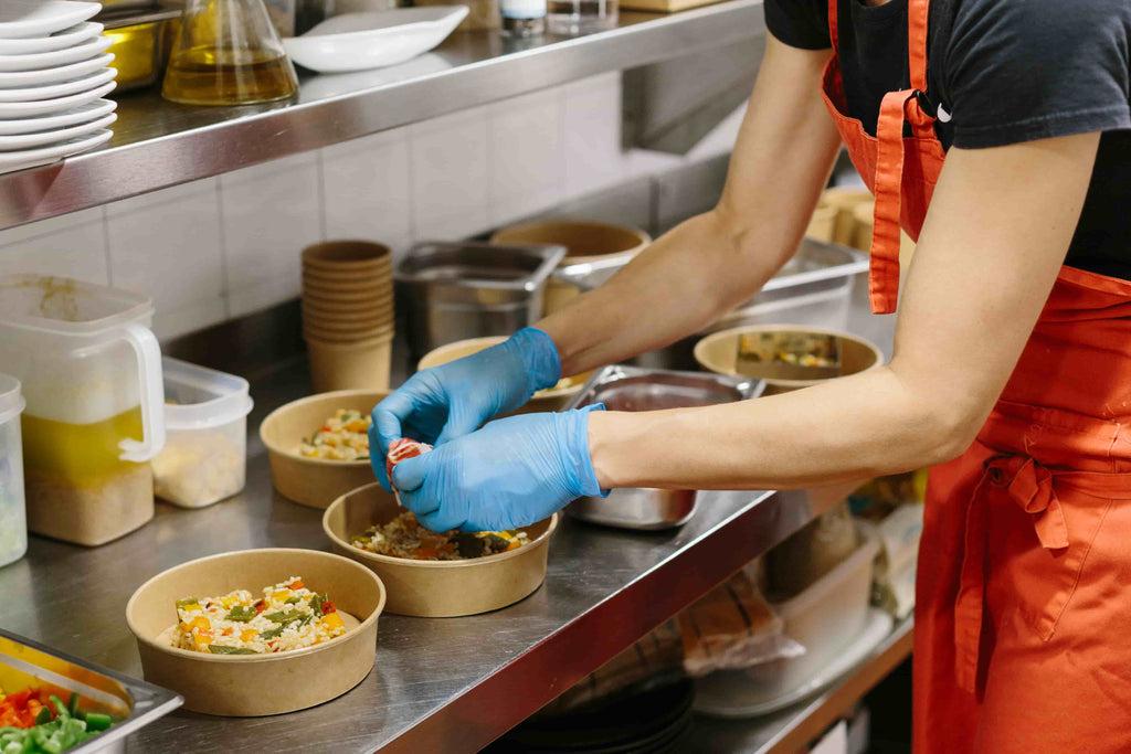 wearing gloves while preparing restaurant food