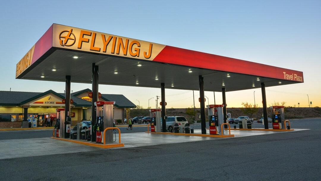 A Flying J gas station at sunset