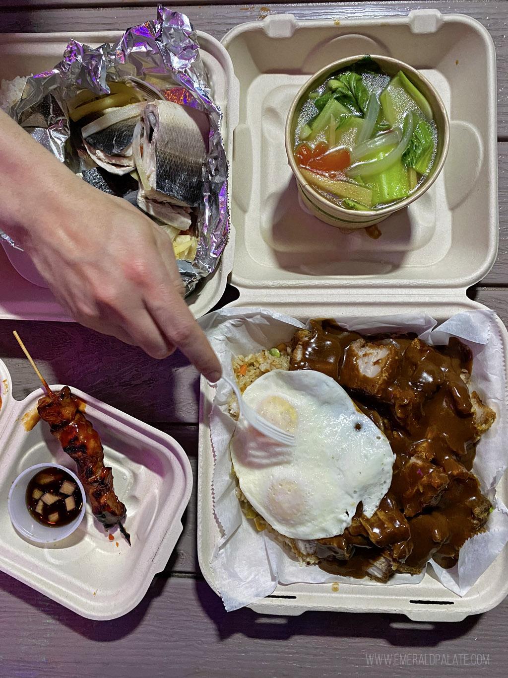 takeout containers of Filipino food from where the locals eat in Maui