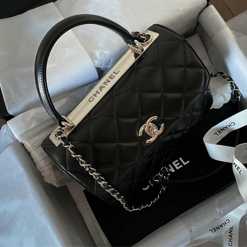 chanel flap bag quilted with top handle