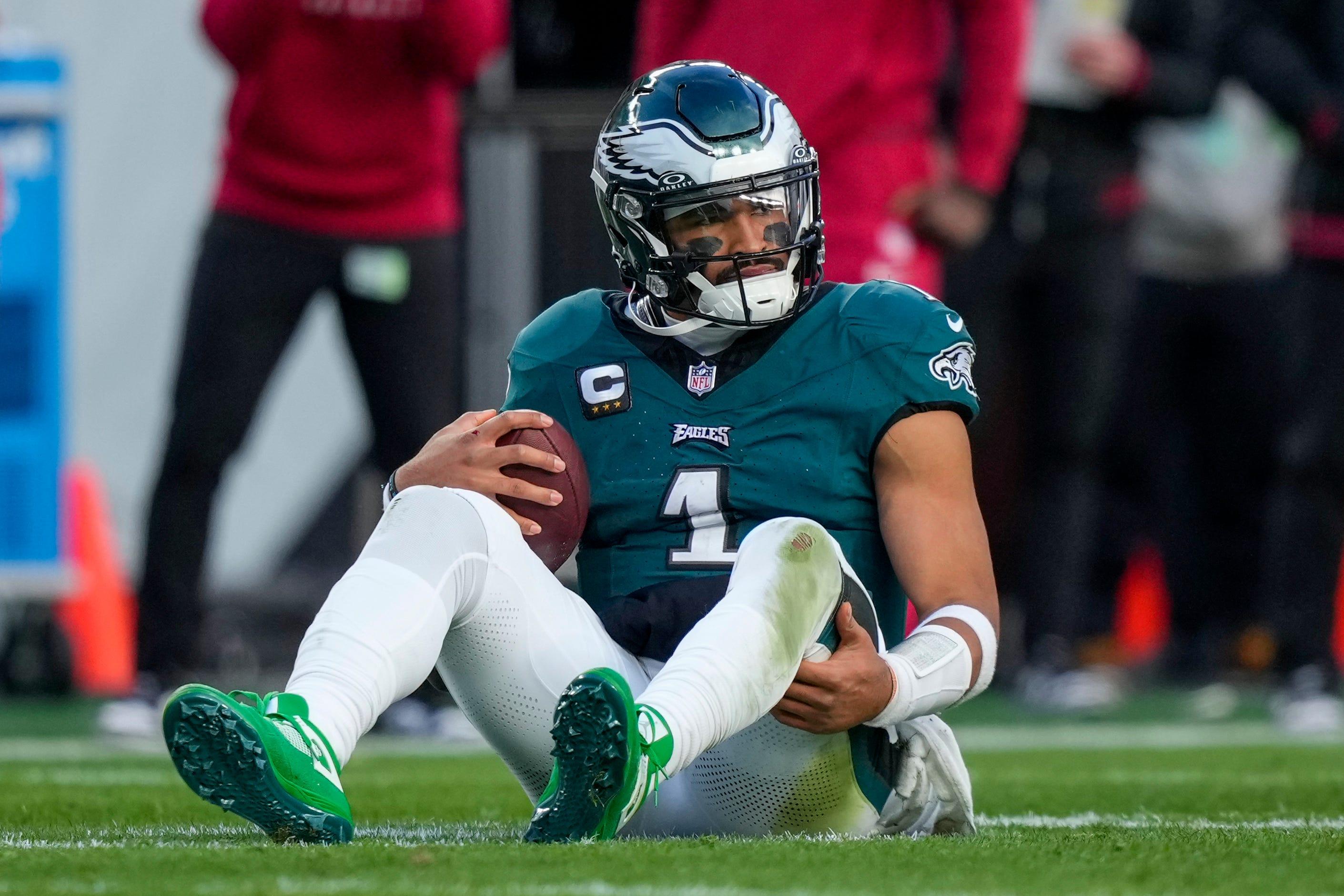 Philadelphia Eagles quarterback Jalen Hurts reacts after being sacked by the Arizona Cardinals.