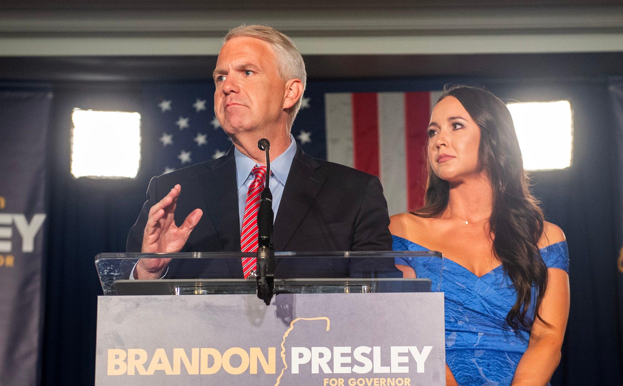 Democratic gubernatorial candidate Brandon Presley, with wife Katelyn Presley by his side, concedes to incumbent Republican Tate Reeves at The Faulkner in Jackson, Miss., Tuesday, Nov. 7, 2023.