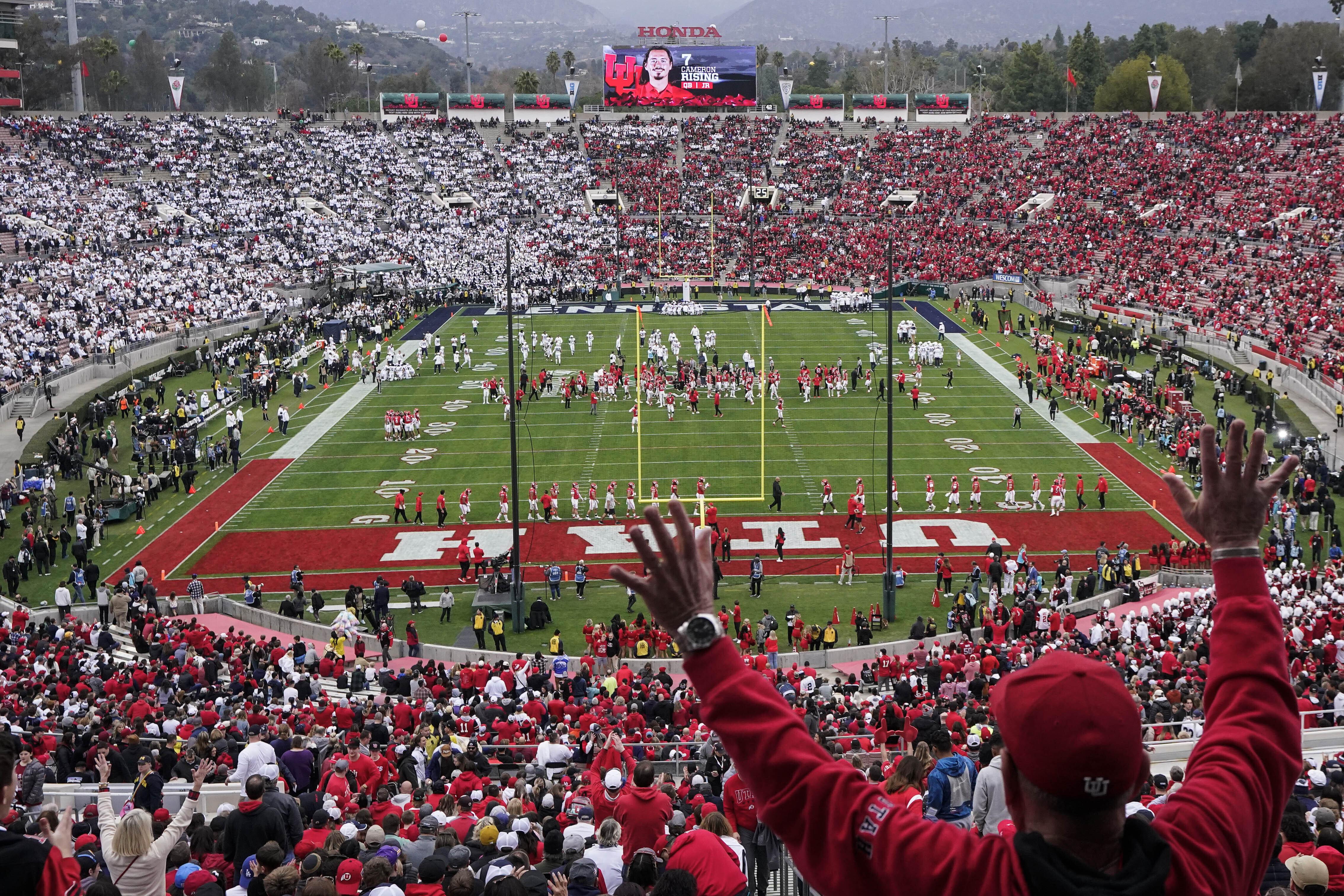 Players warm up on the field before the Rose Bowl NCAA college football game between Penn State and Utah Monday, Jan. 2, 2023, in Pasadena, Calif. (AP Photo/Mark J. Terrill)