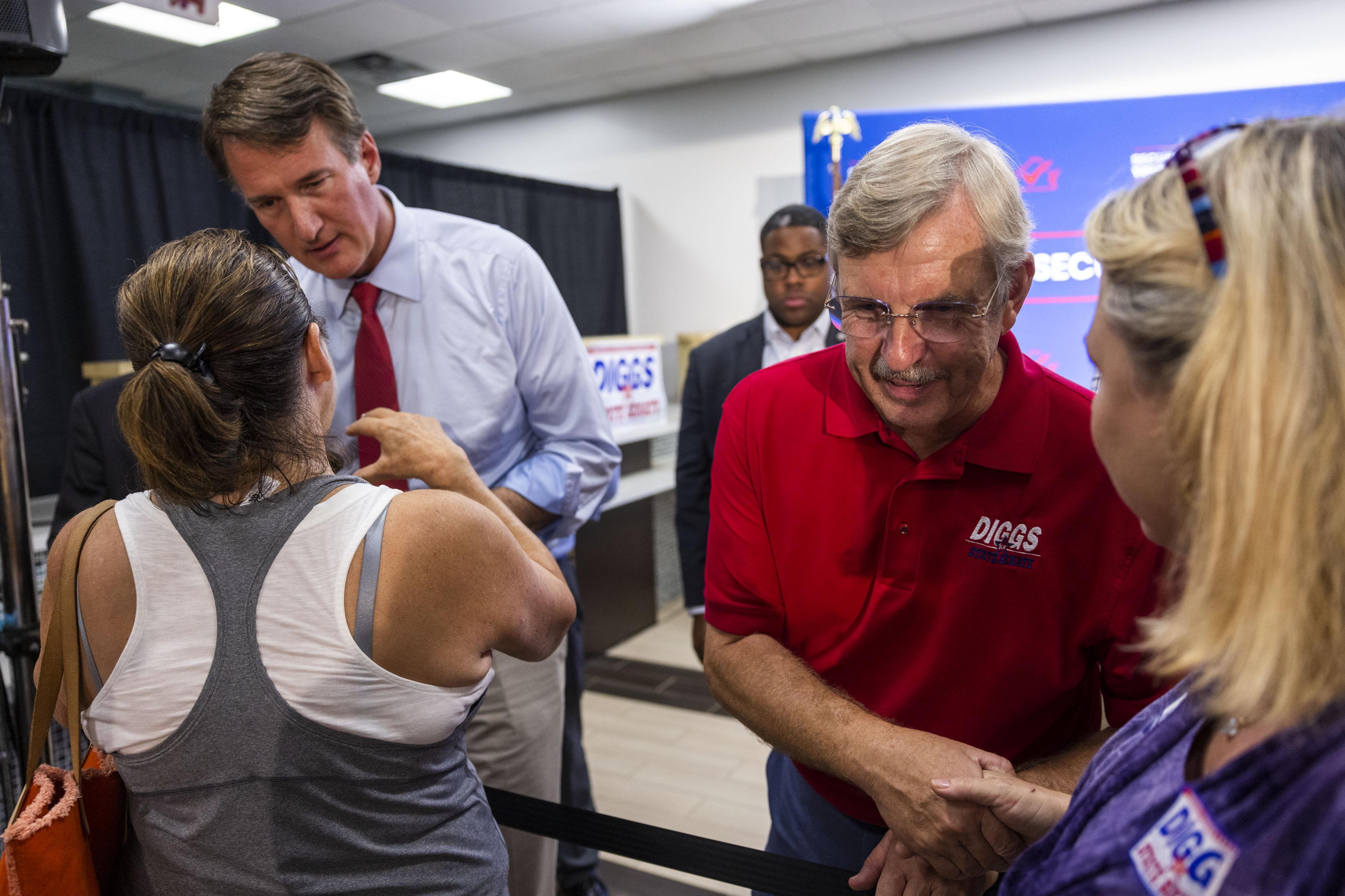 Governor of Virginia Glenn Youngkin and 24th district state senate candidate Danny Diggs speak with supporters following an early voting rally in Newport News on Wednesday, September 20, 2023. (Kendall Warner/The Virginian-Pilot)
