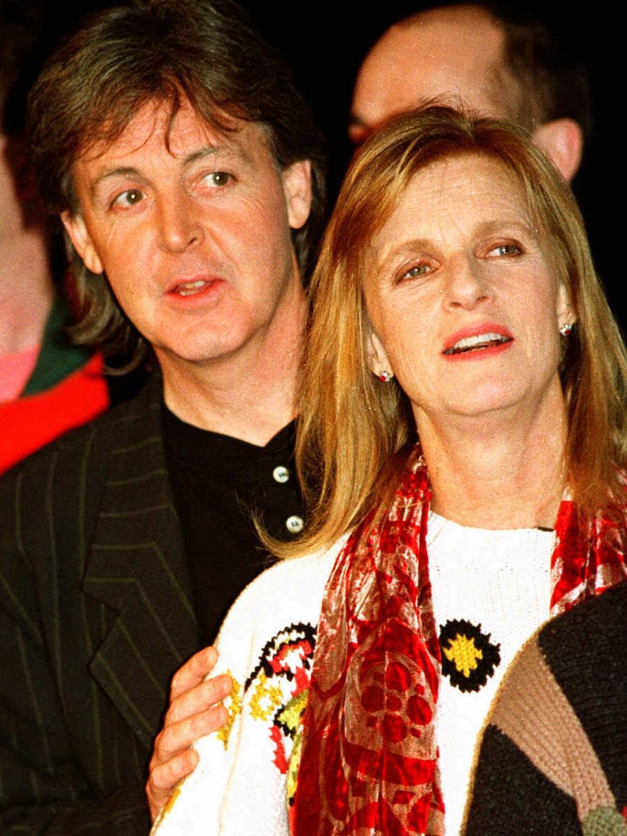 In this file photo, Paul McCartney and his wife Linda give a news conference in New York to announce dates for a world tour on Feb. 12, 1993. Linda McCartney died from cancer in 1998. She was 56.