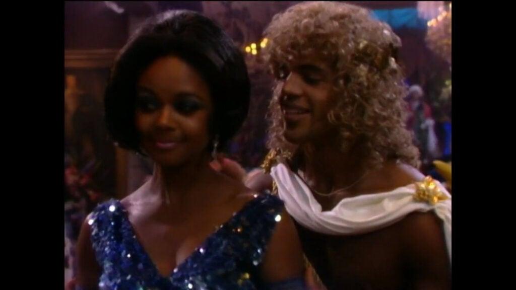 Neil Winters, dressed as Dionysius, and Olivia Barber, dressed as Diana Ross