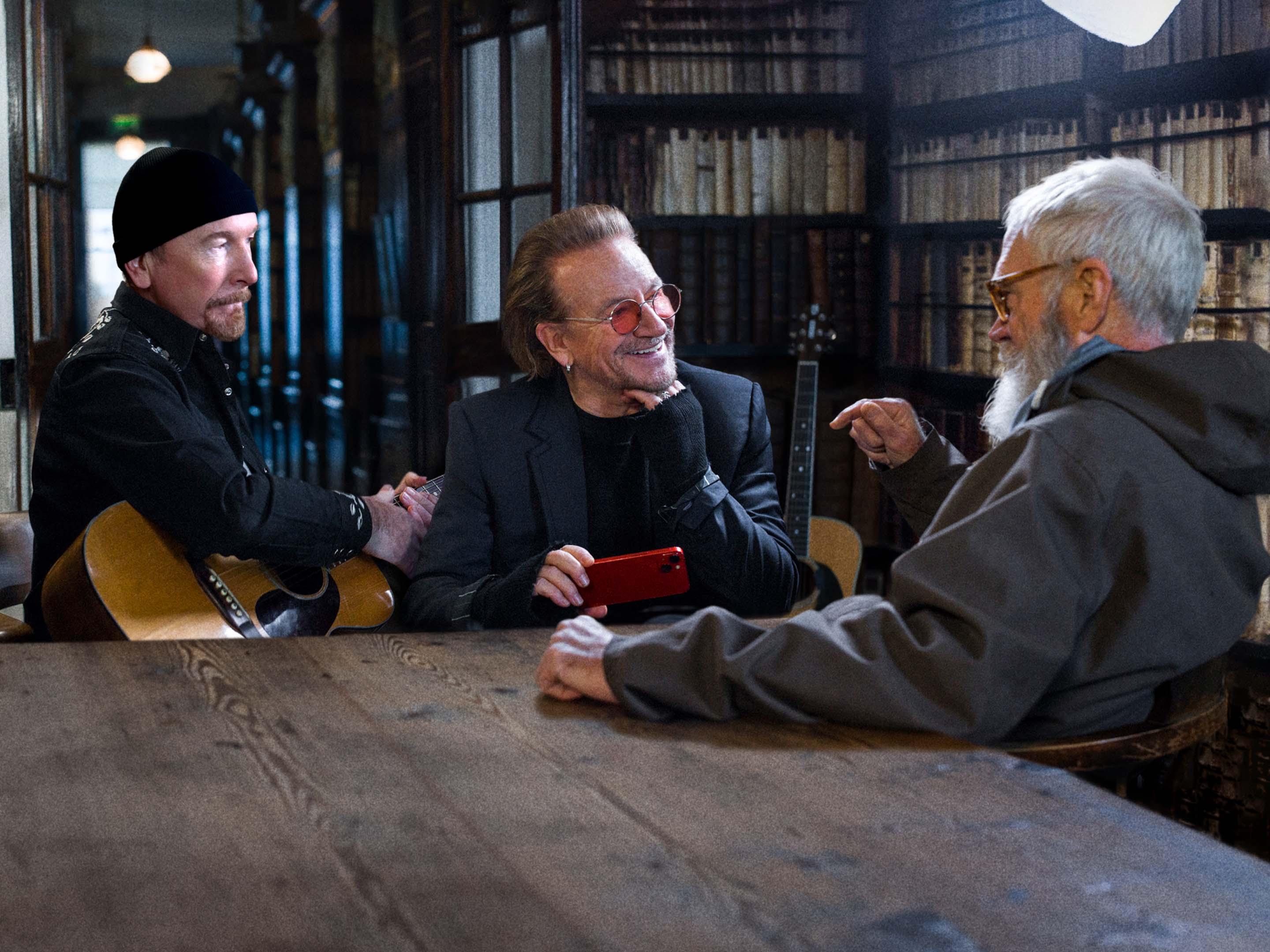 The Edge, Bono and Dave Letterman chat at Marsh