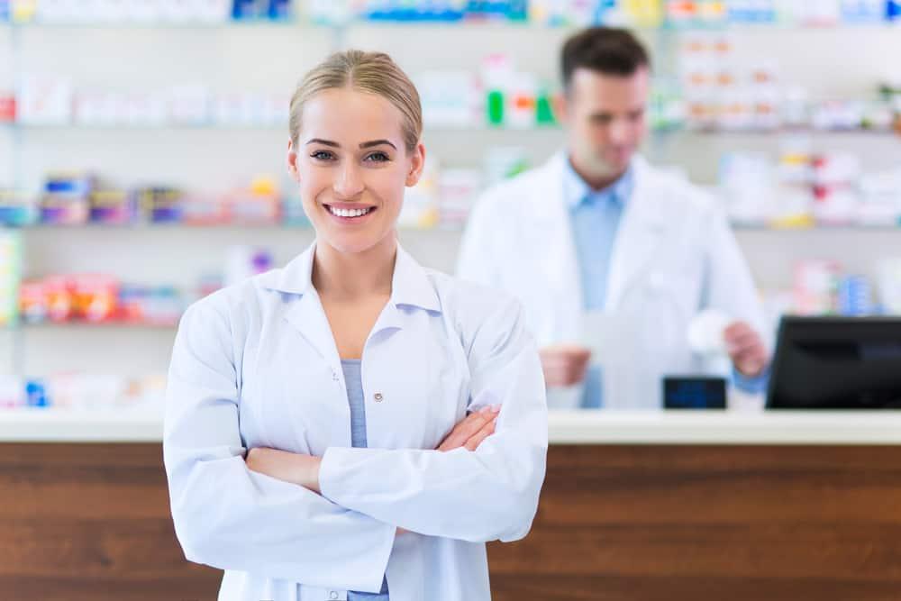 Female and male pharmacists