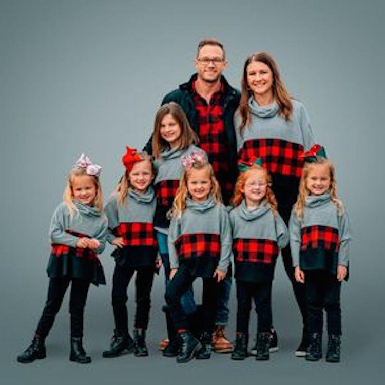 Adam and Danielle Busby with their seven children from TLC