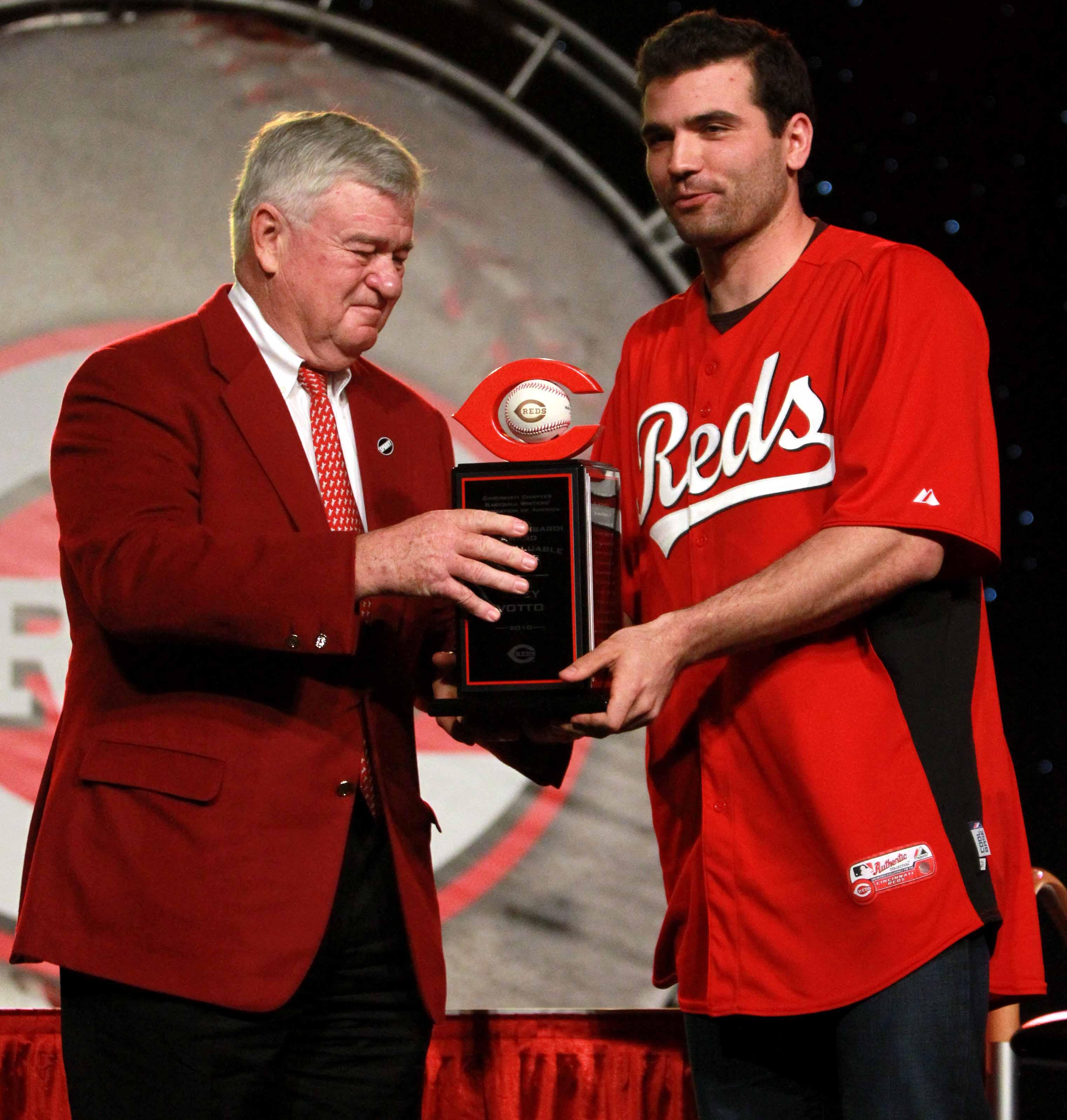 DECEMBER 4, 2010: Reds owner Bob Castellini hands the MVP (the Ernie Lombardi Most Valuable Player award) award to Joey Votto during RedsFest at Duke Energy Convention Center.