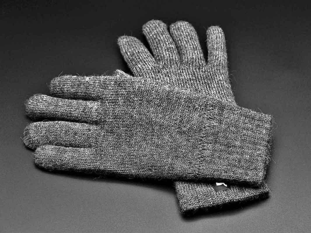 A pair of liner gloves made of wool