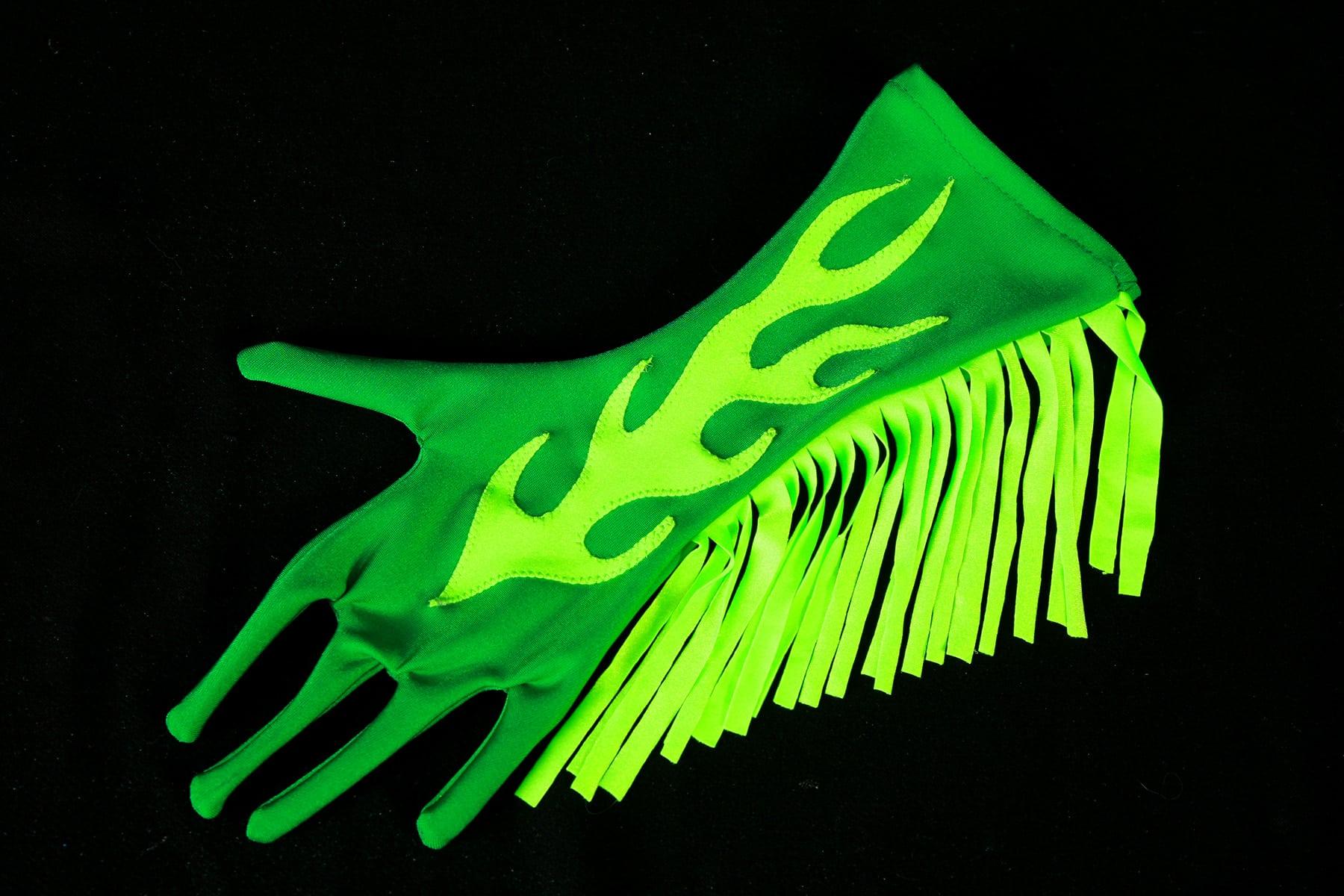 A dark green glove with bright green finge up one side, and a bright green appliqued flame design up the middle.