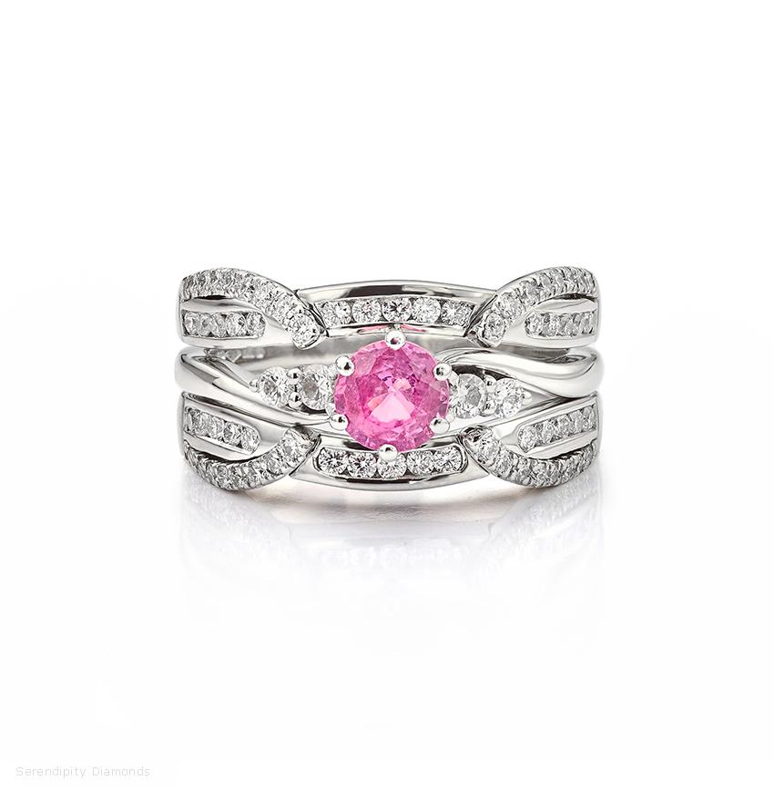 Enhancer wedding ring with pink sapphire and diamond engagement ring