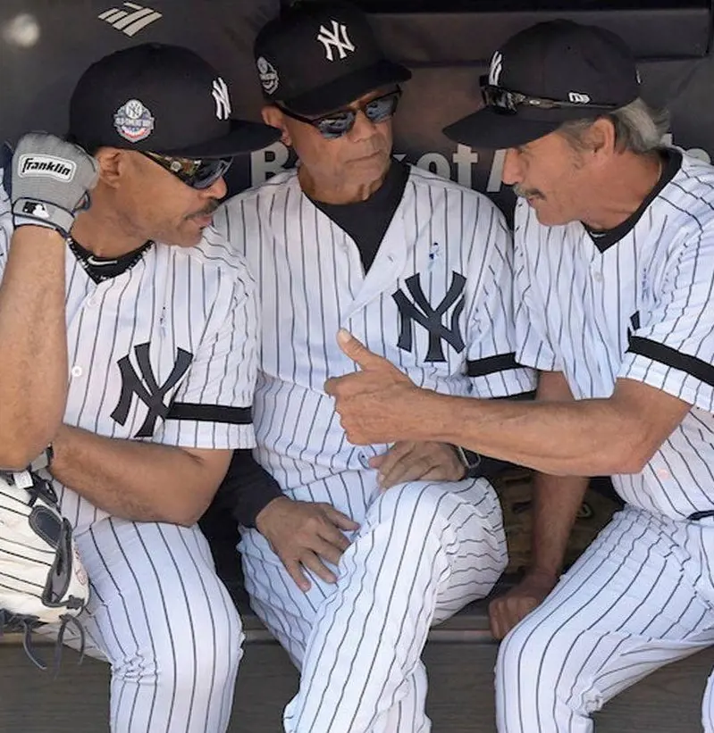 Jesse Barfield (left), Roy White (center) and Ron Guidry (right) discussing with each other in the 2019 Old timers event.