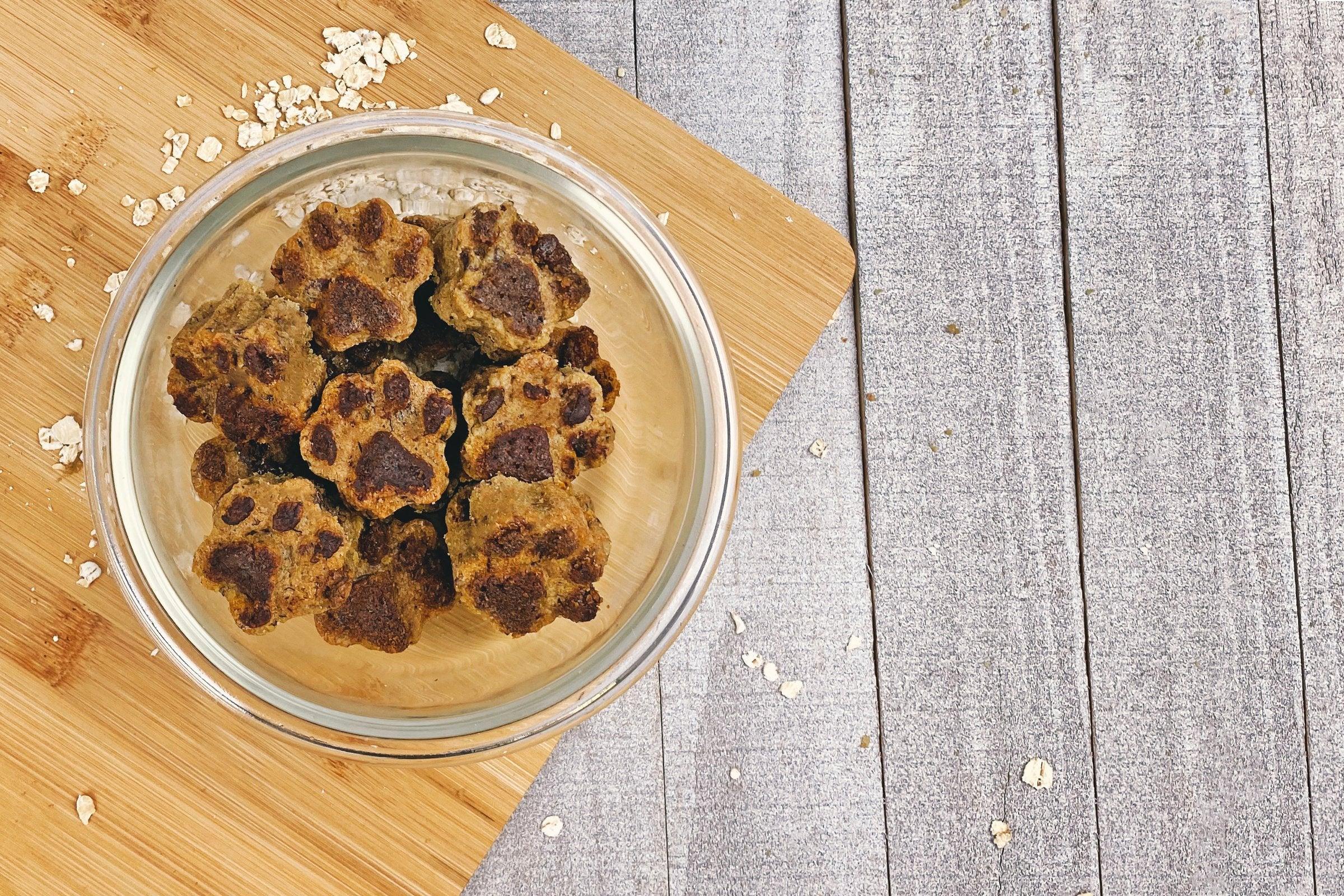 paw shaped dog treats in bowl