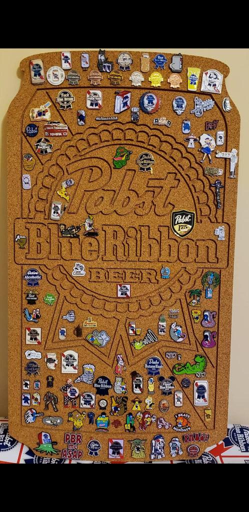 corkboard enamel pin display shaped like a beer can