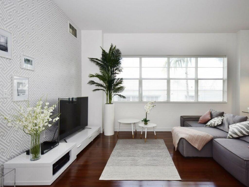 Tall planters in a living room
