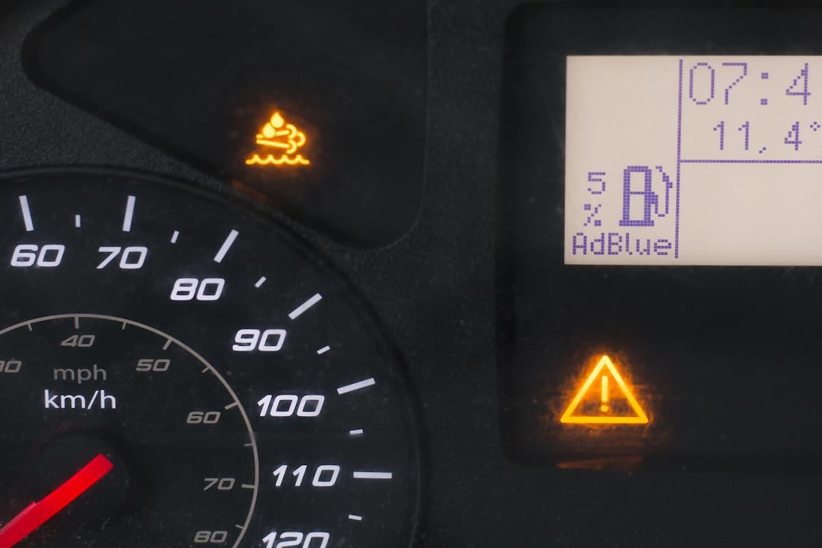 Close up of a truck speedometer with low AdBlue.