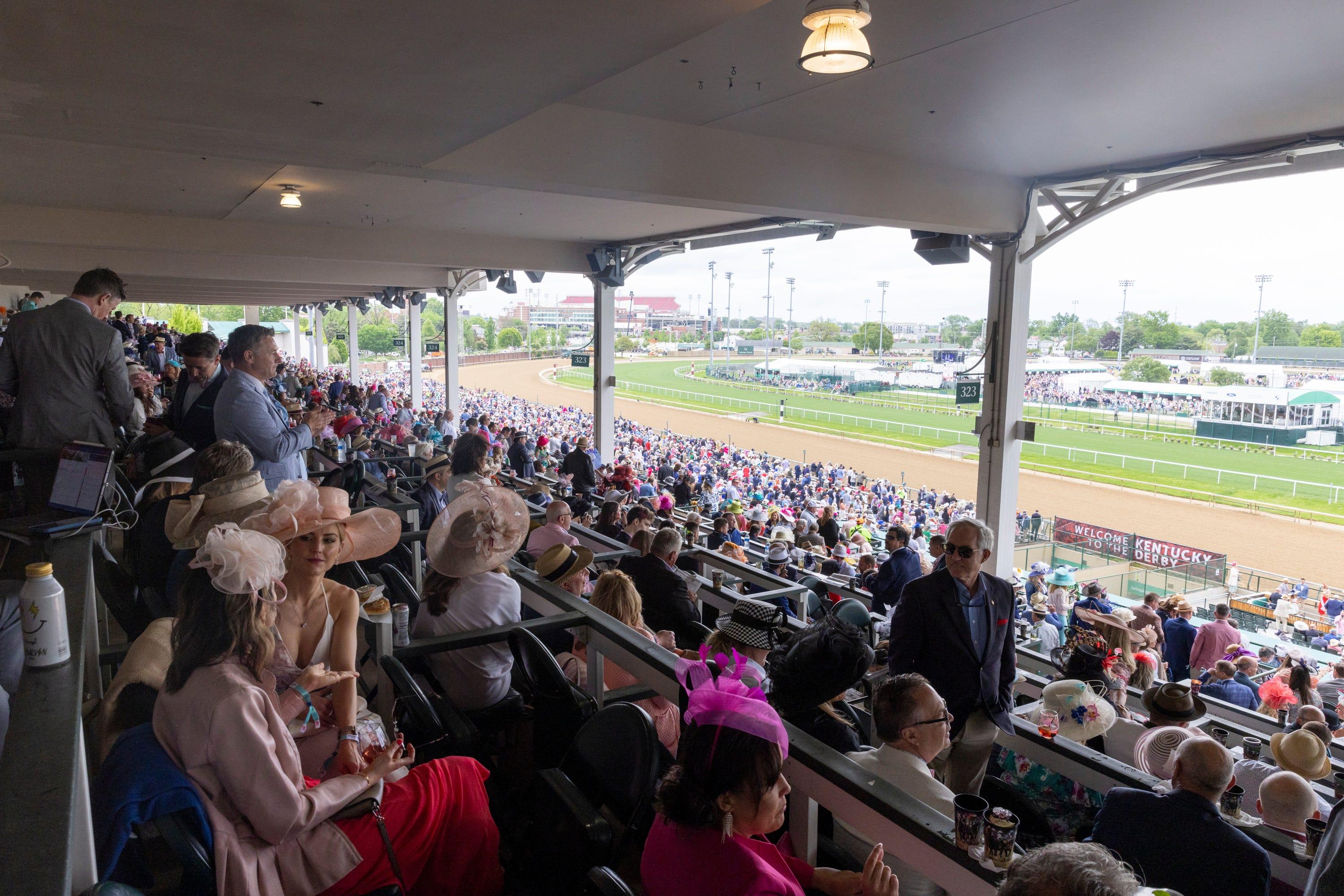 Fans fill the Clubhouse boxes at Churchill Downs on May 7, 2022 in Louisville, Ky.