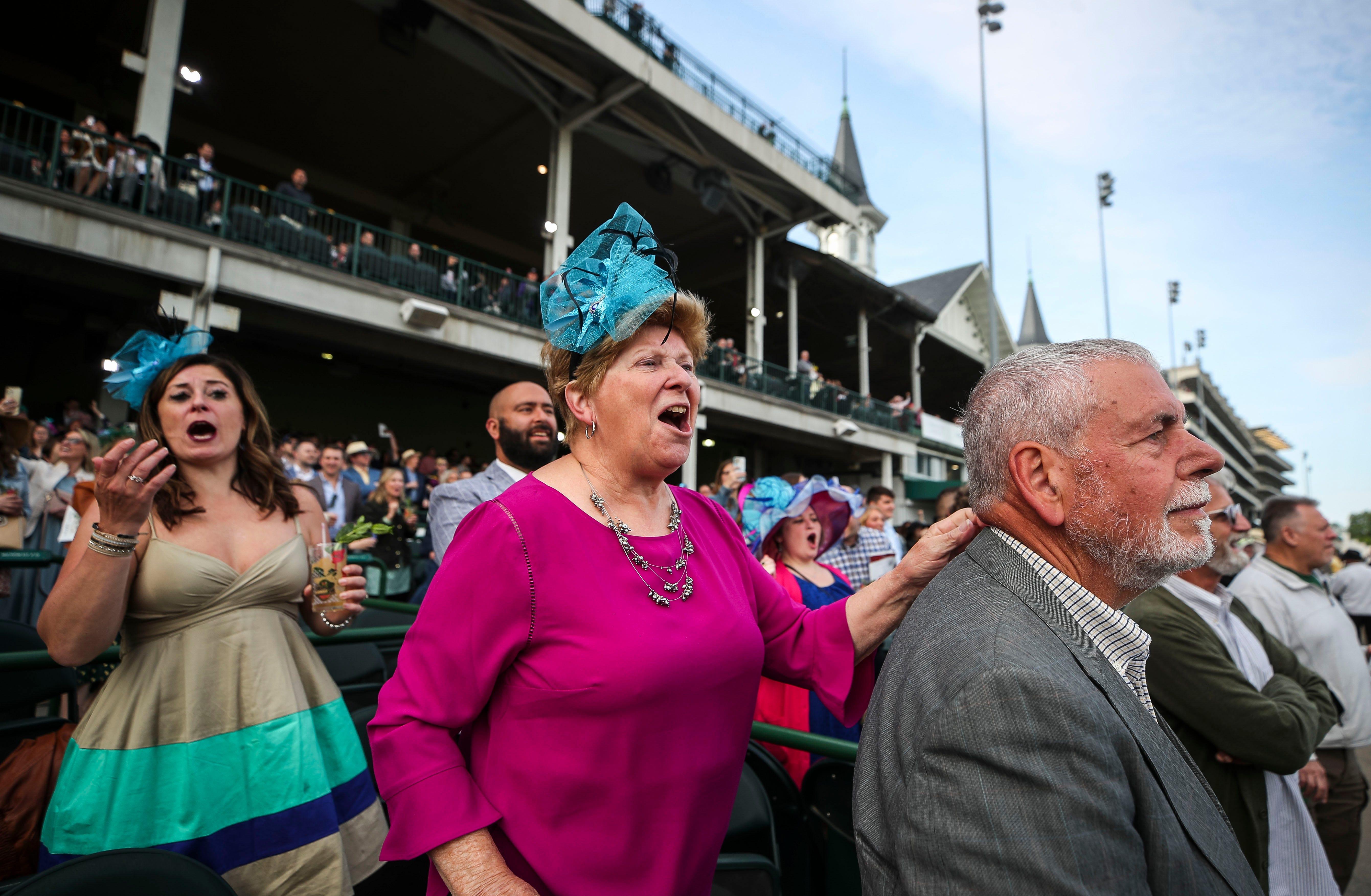 Marsha Dock cheers on her horse as daughter Emily Sheti reacts during to the opening night of the Spring Meet on Saturday, April 29, 2023, as Derby week starts at Churchill Downs in Louisville, Ky. It was Marsha and husband Don - at far right - first time at track since 1971, when they saw the Derby from the infield.