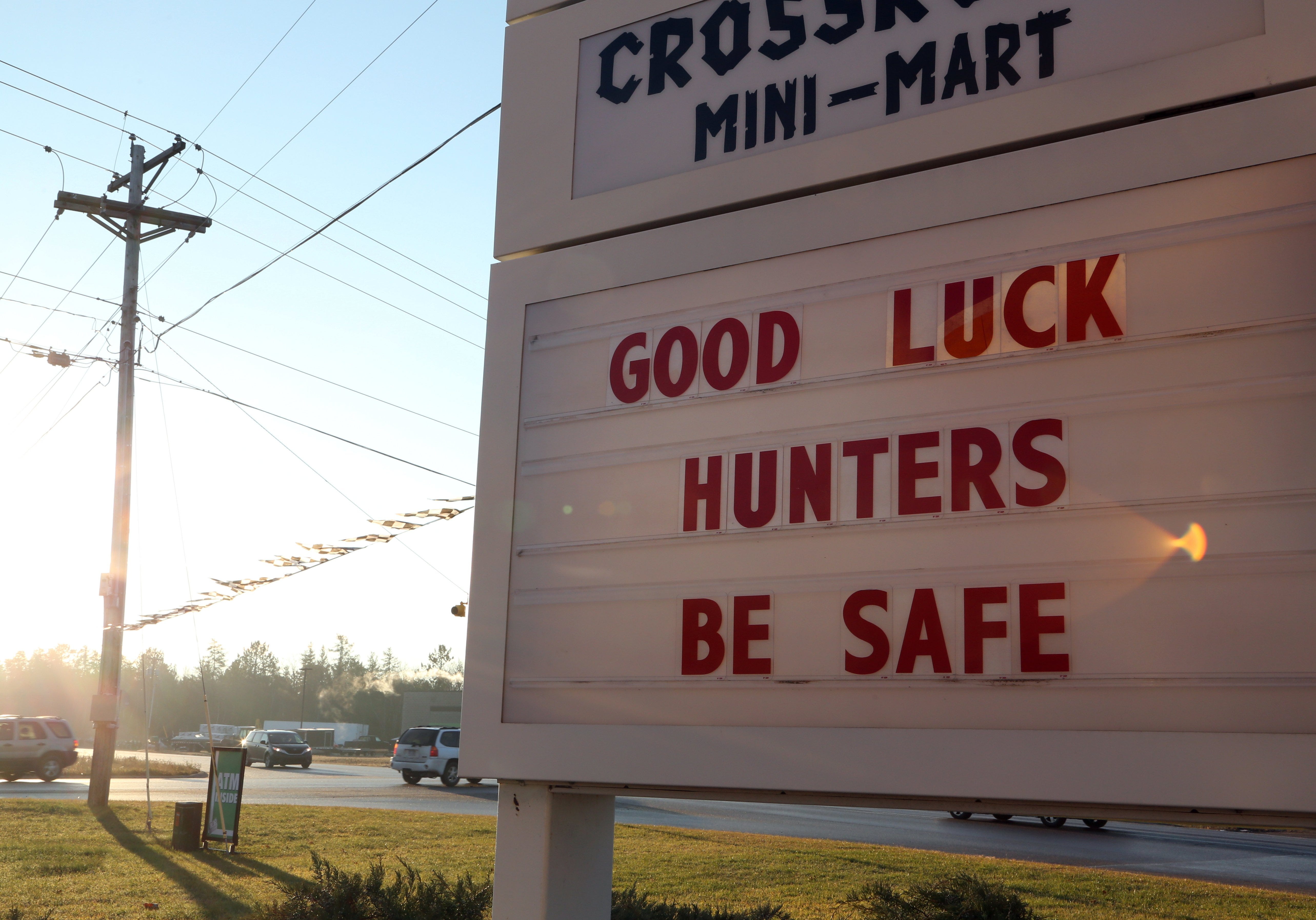 A sign at a gas station just outside of Marquette, Michigan greets hunters driving by or gassing up for the opening day of deer season on Nov. 14, 2013