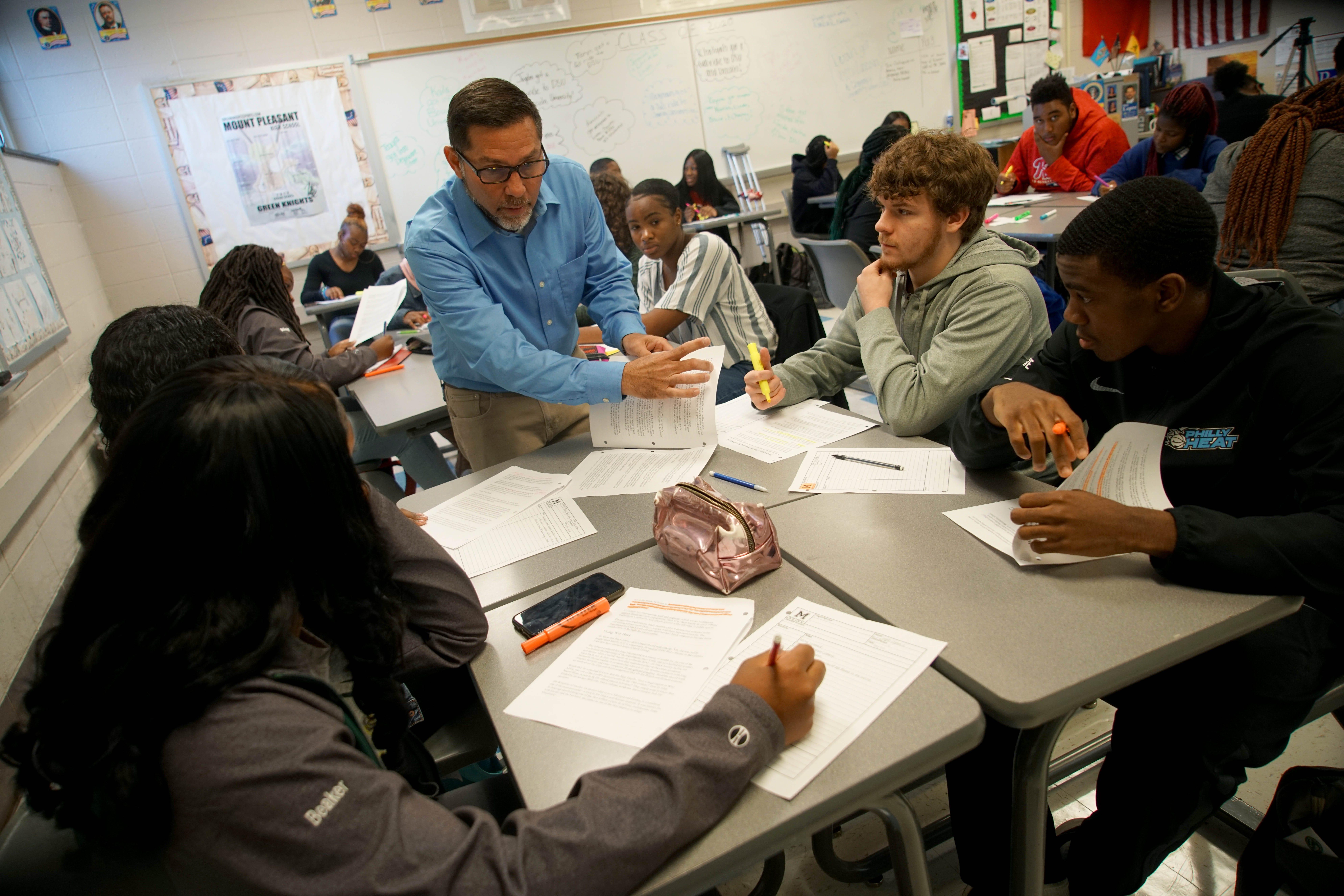 Scott Smith, a history teacher at Mount Pleasant High School, leads his African American studies course in a daily lesson in 2019.