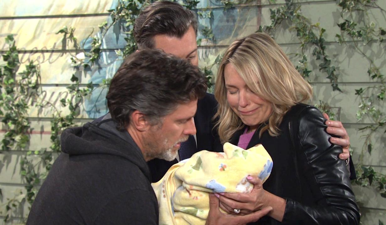 Outside the Pub, an anguished Nicole hands Eric the baby. EJ