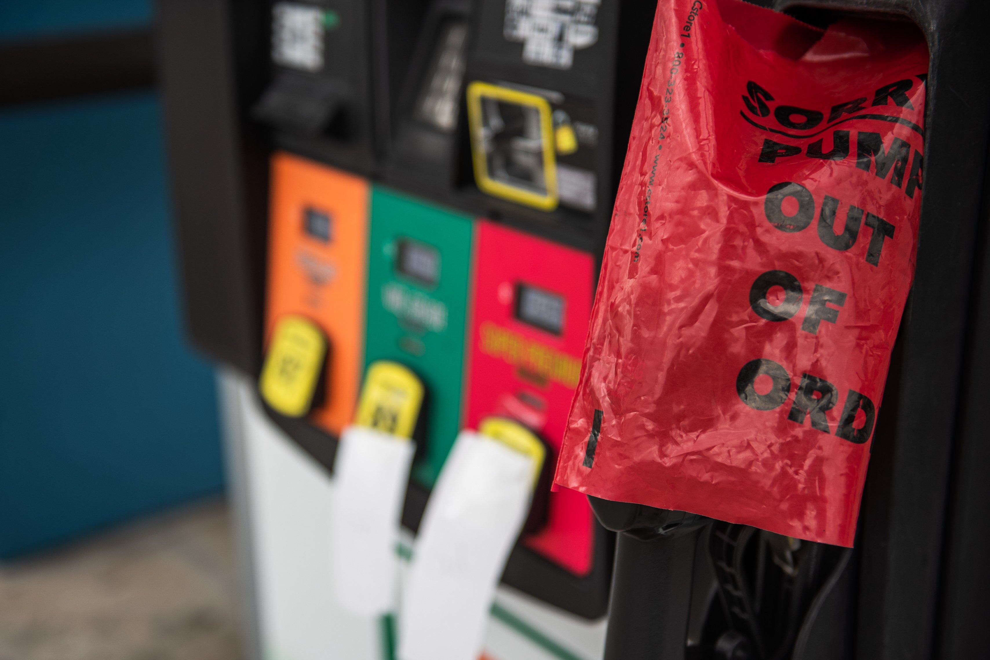 A red bag indicating an empty gas pump hangs on a handle at the 7-Eleven gas station on Southern Boulevard on Monday, April 17, 2023, in West Palm Beach, Fla.