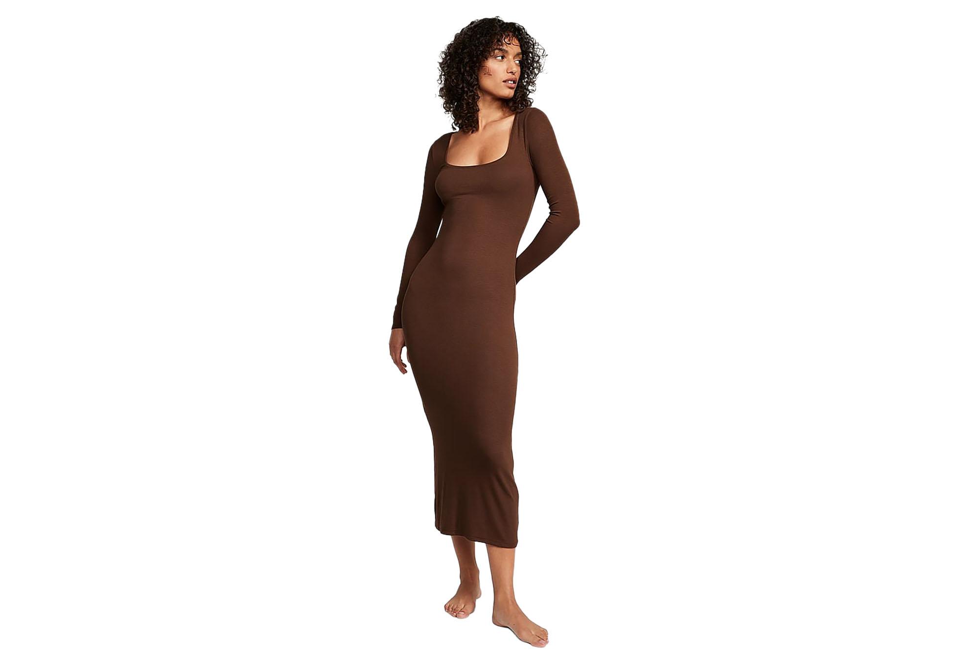 model wearing long brown dress