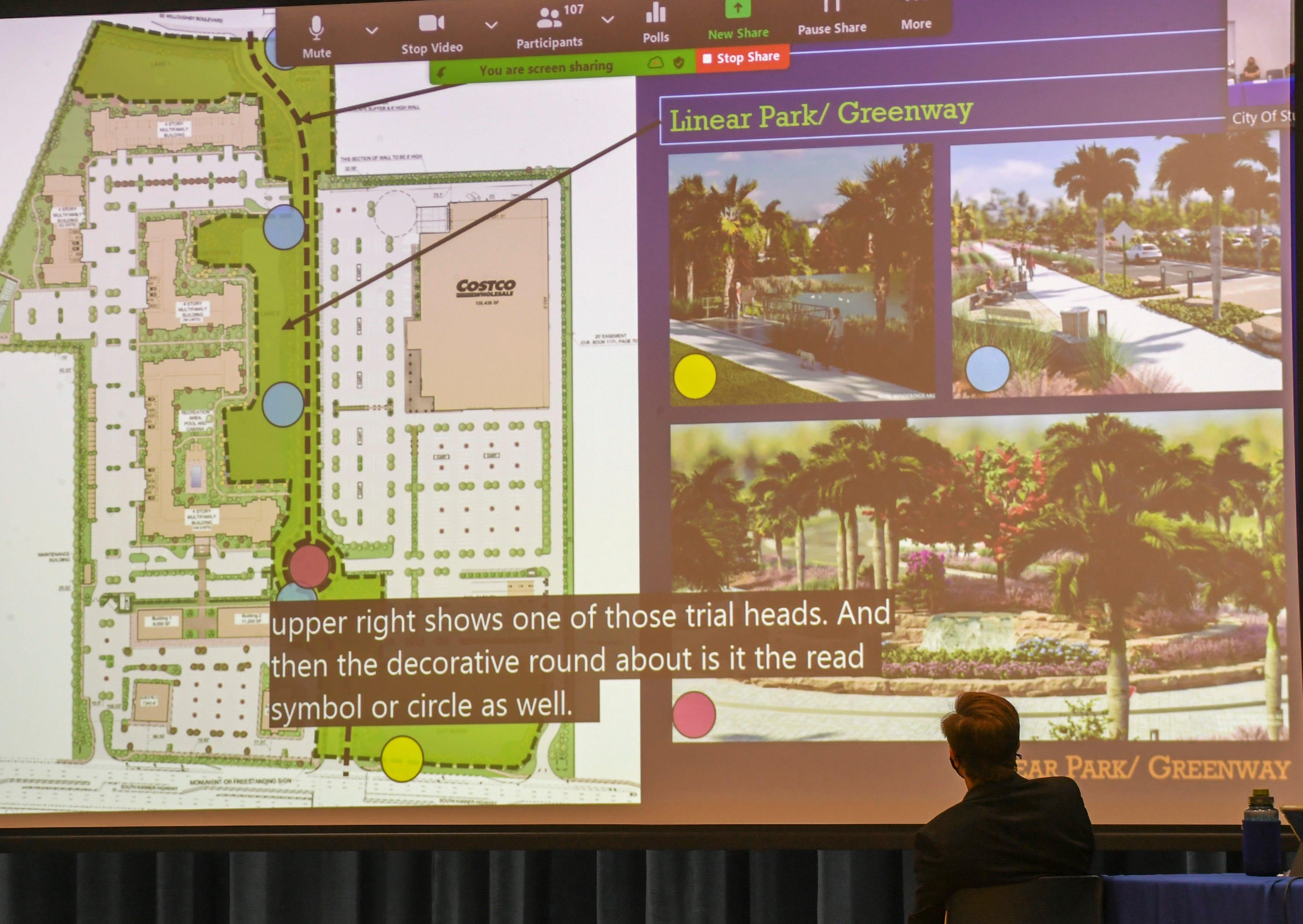 City of Stuart Vice Mayor Merritt Matheson (bottom right) is seen overlooking one of the slides showing the location and features of the proposed Costco site off South Kanner Highway during the developer’s presentation to the Stuart City Commission about a proposed Costco location on Monday, Aug. 9, 2021, in Stuart. The commission approved the build after an eight-hour meeting.