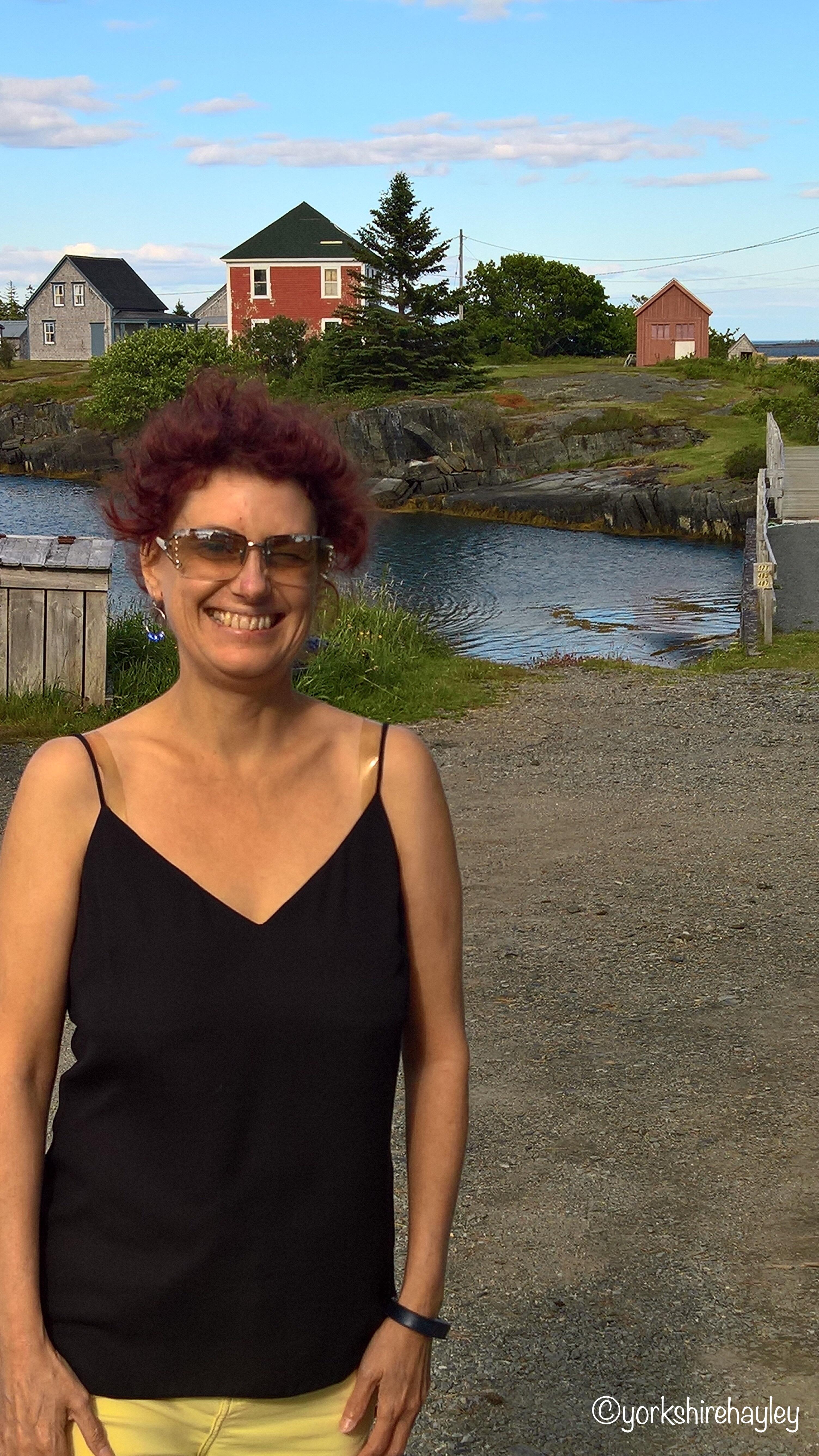 In Stonehurst Cove with the red house used in the Jesse Stone movies behind me
