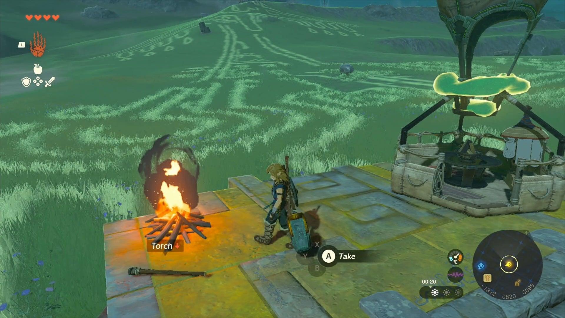 Link walking towards a campfire as he fixes Impa