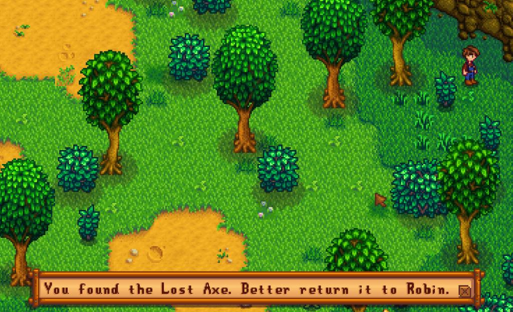 The player standing in Cindersnap Forest. The text at the bottom of the page reads, "You found the Lost Axe. Better return it to Robin."