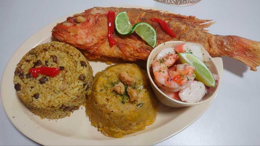 Rice, shrimps, and fish on a plate in Puerto Rico