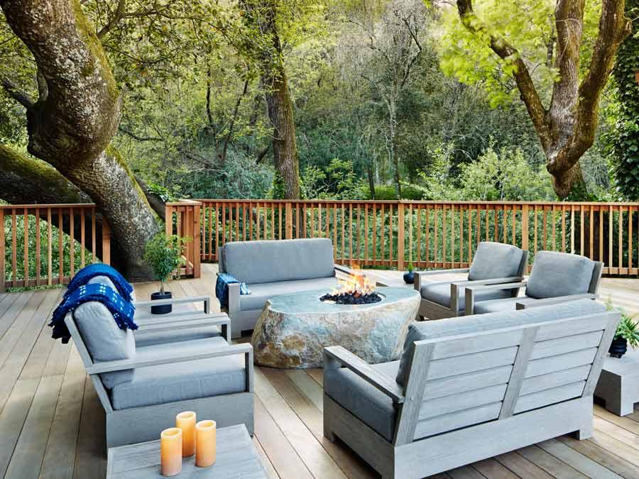 Lounge chairs surround a fire pit at Gaige House + Ryokan, Glen Ellen