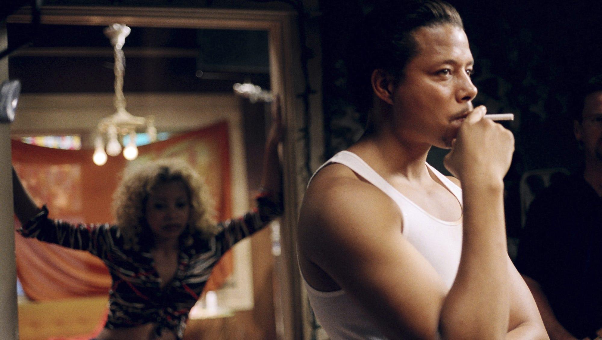 Paula Jai Parker, back, as Lexus and Terrence Howard as DJay in a scene from "Hustle & Flow."