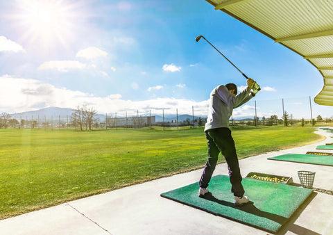 golfer golfing at a range