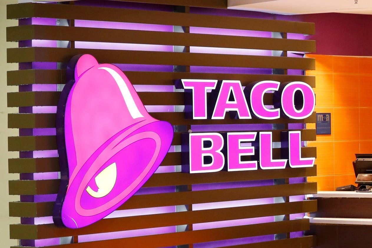 The Taco Bell logo is seen, April 19, 2019, at a restaurant in Miami.
