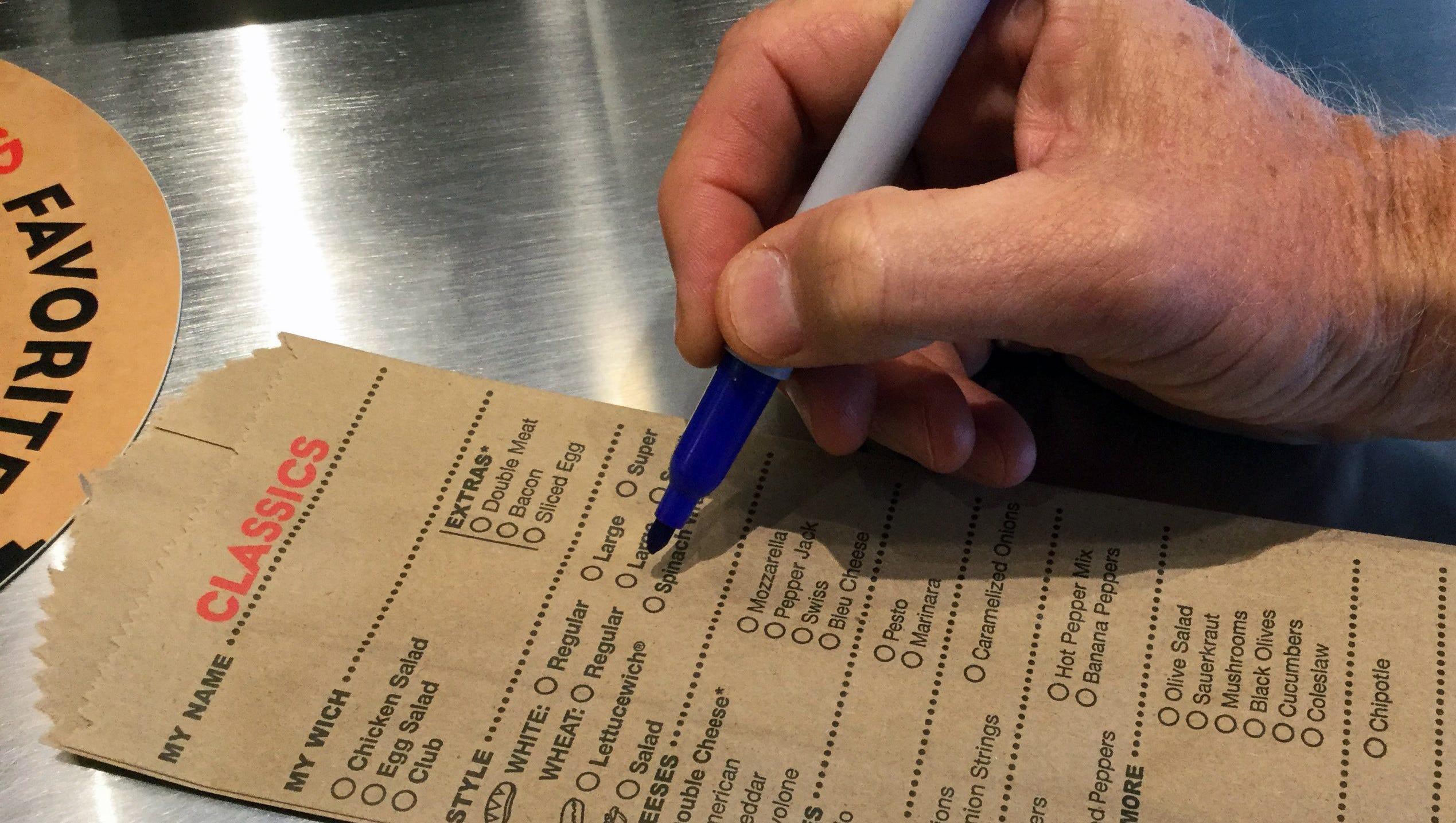 There is no pressure or time limit when ordering a sandwich at Which Wich. Customers can take their time building their favorite sub using order sandwich bags.